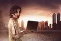 Horrible male zombies standing typing in laptop looking at behind