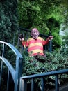 Horrifying Halloween dummy displayed in bushes on NW Thurman Street, Portland, Oregon, October 2020.