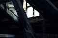 Horror background causing fear. Scary mystical mysterious dark attic room in an abandoned wooden old empty house with a strange Royalty Free Stock Photo