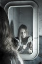 Horror girl in the mirror