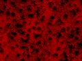 Horror red brush splatter in abstract wall hell with black hole pattern with drips on black paranormal background Royalty Free Stock Photo