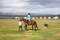 The horse around ger camp in a large meadow at Song kul lake , Naryn of Kyrgyzstan