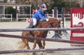 Horse baulking to jump just before the obstacle