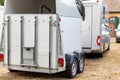 Horse box cargo trailer transport and horse transportation van at farm or ranch. Horsebox carriage lorry animal Royalty Free Stock Photo