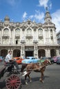 Horse and Buggy with Vintage American Cars Havana Cuba Royalty Free Stock Photo