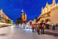 Horse carriage in the market square at the evening old town in Cracow, Poland Royalty Free Stock Photo