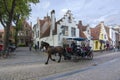 Horse carriage on medieval streets of old Bruges, Belgium