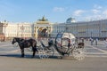 Horse carriage on Palace square with General Staff at background, St. Petersburg, Russia Royalty Free Stock Photo