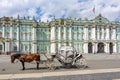 Horse carriage on Palace square and Hermitage museum at background, Saint Petersburg, Russia Royalty Free Stock Photo