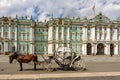 Horse carriage on Palace square and Hermitage museum at background, Saint Petersburg, Russia Royalty Free Stock Photo