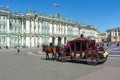 Horse carriage on Palace square and Hermitage museum at background, St. Petersburg, Russia Royalty Free Stock Photo