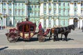 Horse carriage on Palace square and Hermitage museum at background, St. Petersburg, Russia Royalty Free Stock Photo