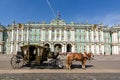 Horse carriage on Palace square and Hermitage museum, Saint Petersburg, Russia Royalty Free Stock Photo