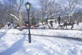 Horse carriage ride in Central Park, Manhattan, New York City, NY after winter snowstorm Royalty Free Stock Photo