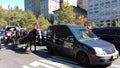 Horse and Carriage Rides Among Traffic, Central Park, NYC, NY, USA