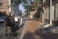 Horse and carriage riding in historic district of old Philadelphia, PA, home of Ben Franklin and Declaration of Independence and