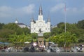 Horse Carriage and tourists in front of Andrew Jackson Statue & St. Louis Cathedral, Jackson Square in New Orleans, Louisiana