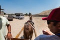 Horse carriage for tourists at the Giza pyramid complex, an archaeological site on the Giza Plateau, on the outskirts of Cairo,