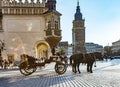 Horse carriages in front of Mariacki church on main square of Kr Royalty Free Stock Photo