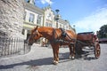 Horse & cart next to the city gates of the old town, in the historic medieval downtown area of the city, Tallinn, Estonia Royalty Free Stock Photo