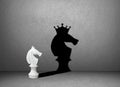 Horse chess shadow on wall, winner Royalty Free Stock Photo