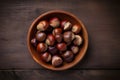 Horse chestnuts wooden table top view. Generate Ai Royalty Free Stock Photo