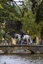 Horse Crossing a Low Bridge in Bourton-on-the-Water, UK
