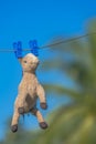 Horse doll hanging on a wire