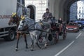 Horse-drawn carriage carrying tourists along the old streets of Vienna, Austria, 12/27/2019 Royalty Free Stock Photo