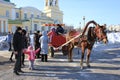 A horse-drawn carriage. City festivals. The holiday of Maslenitsa. Royalty Free Stock Photo