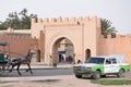 Horse drawn carriage in front of the city wall of Taroudant, Morocco