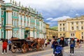 Horse-drawn carriage in front of Winter Palace (Hermitage Museum) on Palace Square in St. Petersburg, Russia Royalty Free Stock Photo