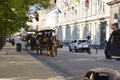 Horse drawn carriage touring visitors around Belgium\'s cobbled streets Royalty Free Stock Photo