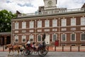 Horse-drawn carriage with tourists at the northern facade of the Independence Hall, Philadelphia, Pennsylvania, USA Royalty Free Stock Photo