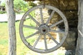 Horse-drawn carriage wheel . Wooden old horse-drawn carriage . The wheel of the horse-drawn carriage hung . Royalty Free Stock Photo