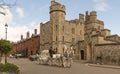Horse drawn carriage with white horses close to Windsor Castle, England, UK.