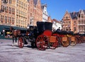 Horse drawn carriages, Bruges. Royalty Free Stock Photo