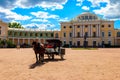 Horse-drawn Wagon On A Square At The Pavlovsk Palace In Pavlovsk, Russia
