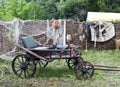 Horse-drawn wagon in the yard of the rural house Royalty Free Stock Photo