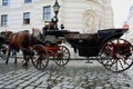 Horse-driven carriage at Hofburg palace, Vienna, Austria Royalty Free Stock Photo