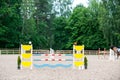 Horse juming show poles at the empty jumping arena Royalty Free Stock Photo