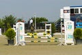 Equitation contest, horse jumping over obstacle