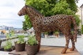 Horse made of horseshoes, weighing several tons and decorated with herbs, is intended to lure visitors to MÃÂ¼nsterplatz over the Royalty Free Stock Photo