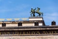 Horse with man bronze sculpture on the roof of Old Museum - Altes Museum in Berlin, Germany