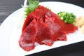 Horse meat sashimi with green onion Royalty Free Stock Photo