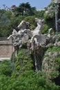 Horse monument flying horses wings Spring Summer Park Green leaves walk branches