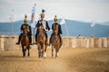 Horse parade during a horse show in with consummated horse riders Royalty Free Stock Photo