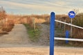 Horse path sign next to the barrier Royalty Free Stock Photo