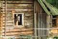 Horse peering out of a window in a barn Royalty Free Stock Photo