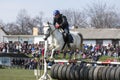 Horse police barrier jumping